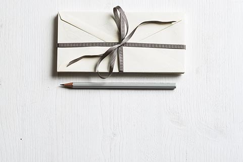 Addressing envelopes and stuffing them